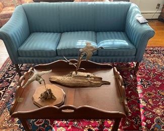 Butlers table, decoys, Chippendale love seat. 
