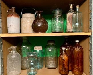 Just a very small sample of a large antique bottle/jar collection