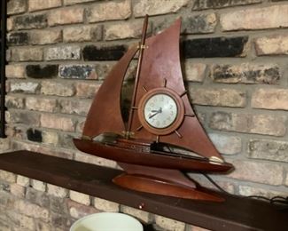 Wooden sailboat with clock