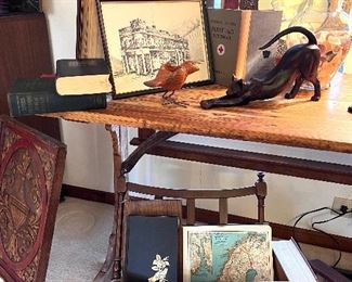 Vintage kitchen table
Various books
Clay pottery
Cat figurines