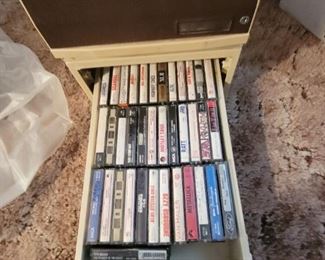 Lots of cassettes rock , rap , country