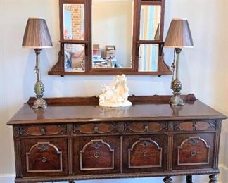 Antique buffet as well as an antique beveled mirror