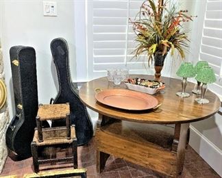 Primitive table which is convertible to a bench