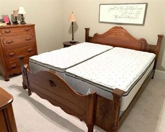 Black walnut bedroom suite.  Antique bed has been professionally converted to a king size bed 