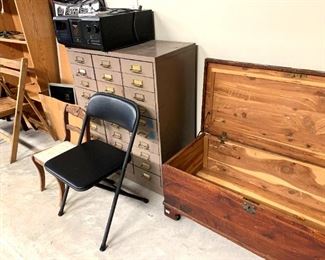 98 Garage upper level multi file cabinet, cedar chest, folding chairs, etc.