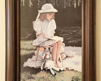 Framed art of sitting girl