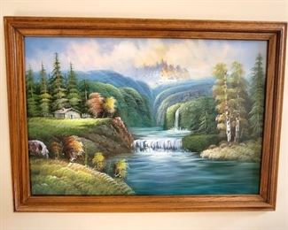Framed oil painting of waterfall
