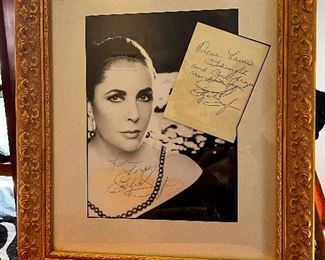 THIS PHOTOGRAPH, WITH PERSONAL NOTES AND AUTOGRAPHS BY ELIZABETH TAYOR WAS CUSTOM FRAMED AND GIVEN TO OUR SELLER'S WIFE BY THE DOWNTOWN RAILWAY EXCHANGE BLDG FLAGSHIP FAMOUS BARR STORE EXECUTIVE WHILE ELIZABETH WAS IN THE STORE ON A WHITE DIAMONDS PERFUME TOUR IN MID 1990'S.  