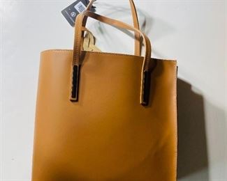 The Sofia Cardoni Leather Handbag With Tags 15 x 5 x 13 Inch shown, and/or similar products are available for shipping or for browsing and purchase at Tysons Jewelry. The price is $60.

Please text or call 7032689529 for inquiries, or visit Tysons Jewelry located at:

8373 Leesburg Pike #12, Vienna Virginia 22182

Additional pictures are available upon request, or more pictures can be viewed on the Facebook listing: https://www.facebook.com/marketplace/item/1517102508736839/

We buy gold and precious metals at 95%. Please see our website to learn more about specific prices, our other products/services & additional ways to get in contact:

https://tysonsjewelry.net

Jewelry resizing, and repair services are available at the store. Inquiries regarding gold, silver, precious metals, coins, watches, diamonds, cars, and collectibles are welcome!