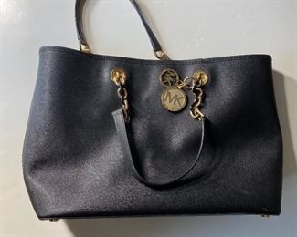The Michael Kors Black Leather Handbag 19 x 11 x 6 Inches shown, and/or similar products are available for shipping or for browsing and purchase at Tysons Jewelry. The price is $150.

Please text or call 7032689529 for inquiries, or visit Tysons Jewelry located at:

8373 Leesburg Pike #12, Vienna Virginia 22182

Additional pictures are available upon request, or more pictures can be viewed on the Facebook listing: https://www.facebook.com/marketplace/item/1110815866462554/

We buy gold and precious metals at 95%. Please see our website to learn more about specific prices, our other products/services & additional ways to get in contact:

https://tysonsjewelry.net

Jewelry resizing, and repair services are available at the store. Inquiries regarding gold, silver, precious metals, coins, watches, diamonds, cars, and collectibles are welcome!