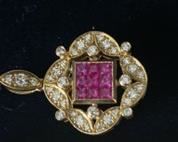 18K Gold Pendant with Diamonds and Gemstone