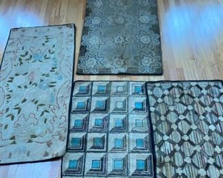 Many hooked rugs from the family house in Nova Scotia