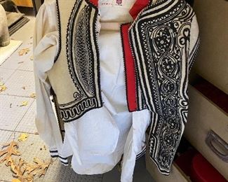 This is a great little find. A steamer Trunk with Halloween Costumes most likely from the 20's