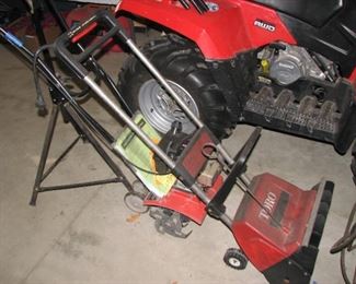 Tiller and snow broom