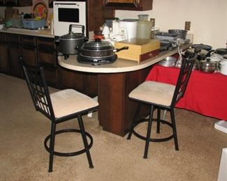 kitchen items and bar stools