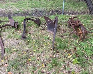 Antique Farm Tools. Plows and Seed Planter.