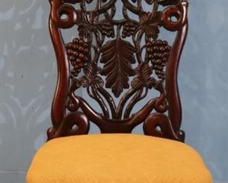 76 - Rosewood rococo laminated pierce carved slipper chair by Belter, 44 in. T, 18 in. W, 18 in. D.