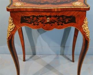 Fine and rare kingwood, rosewood and ebonized dressing table with intricate floral and bird motifs, extraordinary bronze mounts and Sevres plaques attrib. to Leon Marcotte