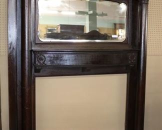 87 - Solid oak mantle with bevel mirror from a 1910 demolished home with original finish and in great condition, 88 in. T, 61 in. W, 14 in. D.
