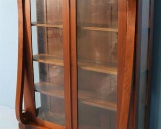 97 - Mahogany Empire Revival over sized china cabinet in good condition, 6 ft. 2 in, 35 in. W, 19 in. D.