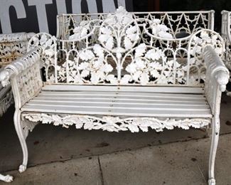 276A - Heavy cast iron garden bench with dog head on arms, 38 in. T, 28 in. D, 51 in. W.