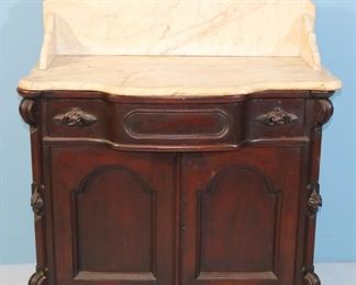 90 - Walnut Victorian washstand attrib. to Mitchell & Rammelsberg with original marble and finish, 44 in. T, 35.5 in. W, 19.5 in. D.