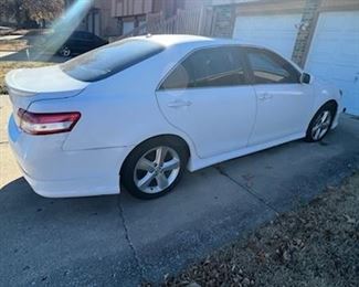  4 door 2011 Toyota Camry running with clean title; needs the heater core replaced. 