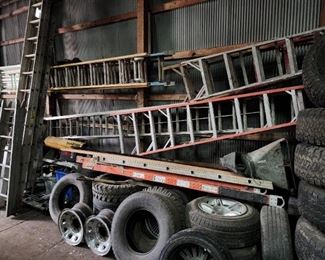 Various ladders and tires. 