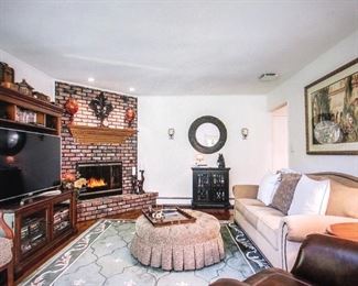 Living Room Suite ~ Entertainment Center~ Rolling Ottoman ~ Rugs ~ Sofa ~ Wall Art 