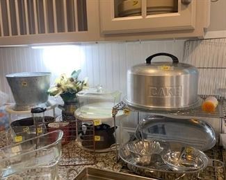 Vintage Cake Sever and Pyrex bowls and Tupperware,