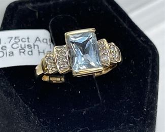Gold Ring with Aquamarine 1.75ct center stone accented by diamonds