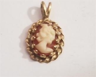 Tiny 14k yellow gold pendant