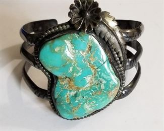 Signed vintage large Navajo Turquoise & sterling silver cuff bracelet, please note that this stone dose have a crack as seen in the photos, the stone is set nice and tight.