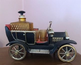 Vintage music box liquor decanter with shot glasses