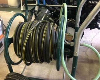 Garden hose reel cart on wheels 