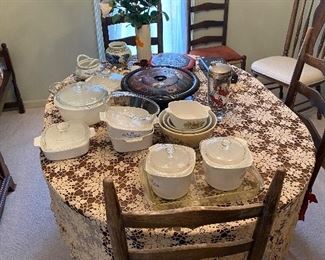 Tables, chairs, and Corning Wares.