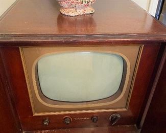 Two of these groovy TV cabinets.