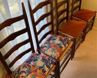 Set of four farmhouse style chairs.