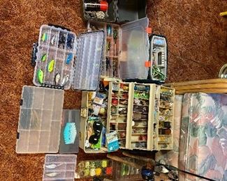 Loads of fishing gear! Some nice antique lures in there as well.