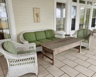 Palecek Bridgeport Collection 3 seater sofa and 2 large chairs with Brunschwig Fils Outdoor fabric.  Antique baker's table.