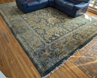 Large and Gorgeous Wool Area Rug. There is some light wear on the fringe but in overall very good condition.

Measures 117" x 166". 