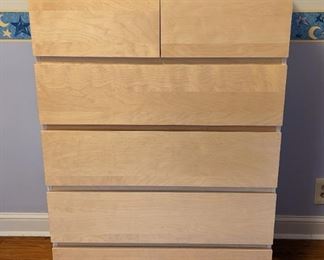 Blonde Wood Dresser. Measures 31.5” wide, 19” deep and 48.5” high