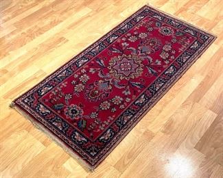 Vibrant Vintage Rug measures 26x44 inches and provides a beautiful colorful design