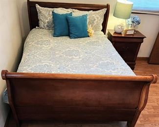 Sleigh bed by I.F.W. International Furniture Wholesalers