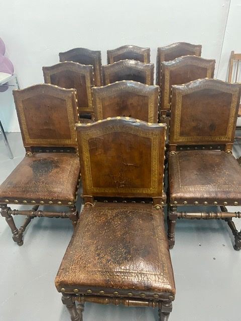 10 Spanish style embossed leather chairs.