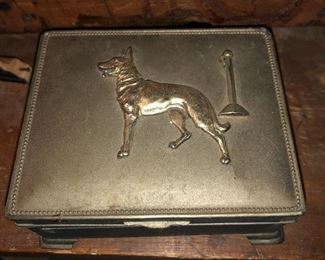 metal box with German shepard 