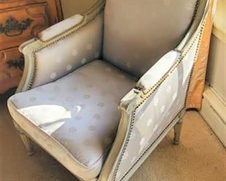 One of several Louis XV style Bergere arm chairs