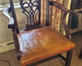 Single Chippendale style arm chair with leather seat