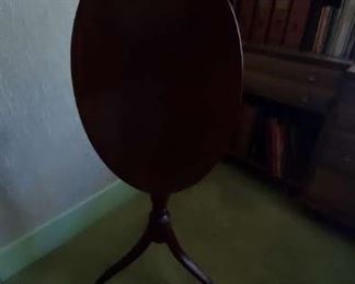 Antique oval top candlestand