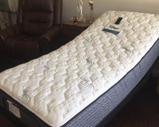 Virtually new Ease lift base with Tempur XL twin mattress